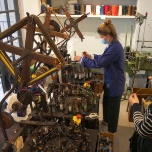 braiding on authentic 200-year-old wooden looms